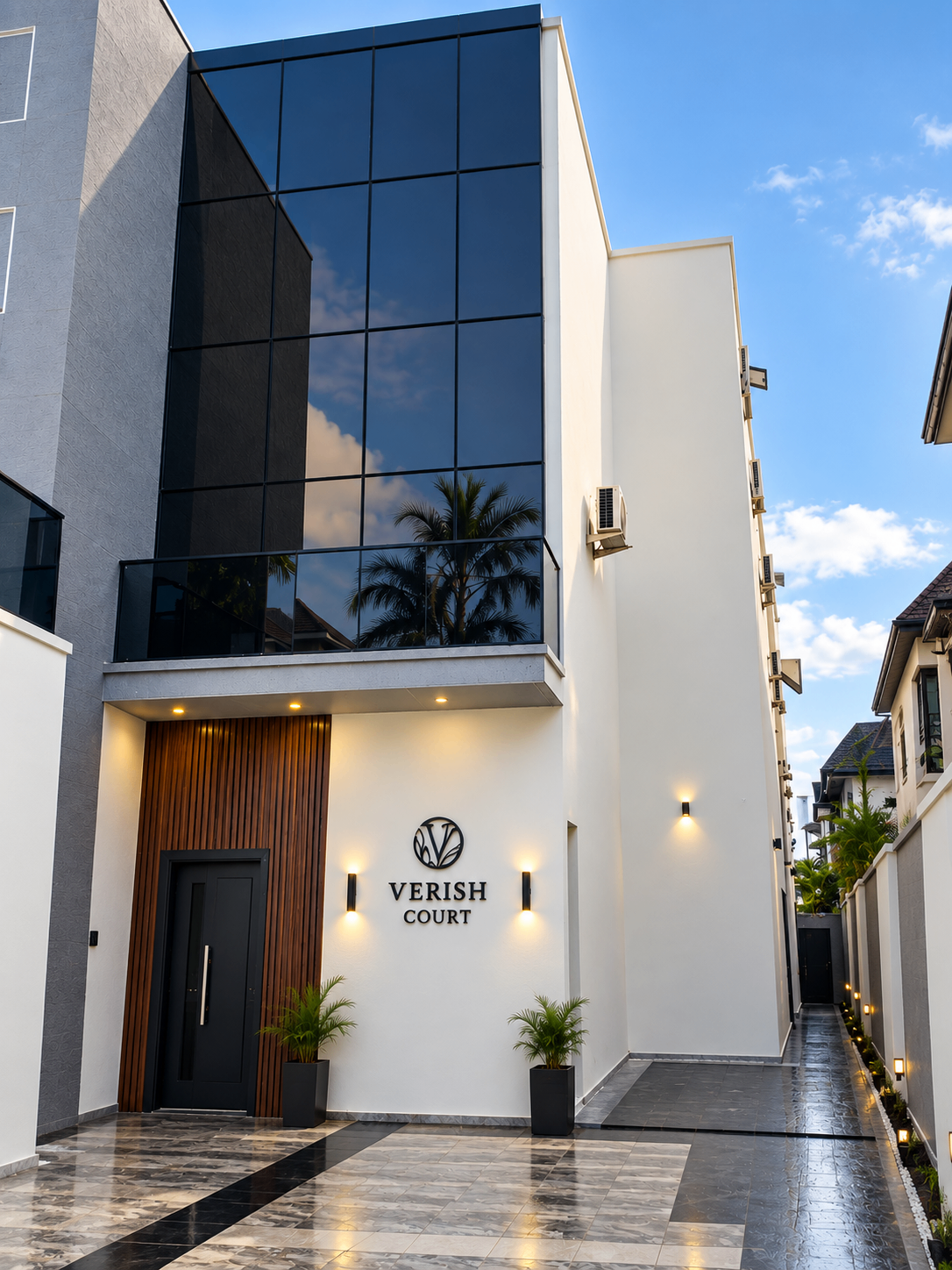 Verish Court private entrance with illuminated facade
